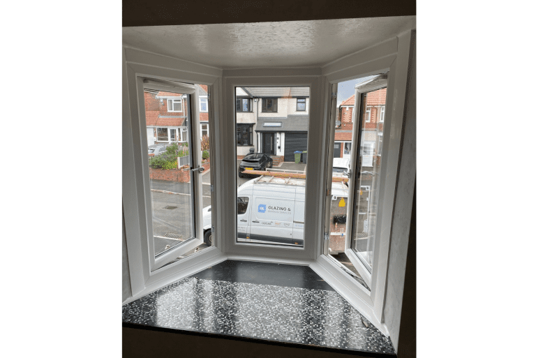 Freshly installed casement windows providing natural light in Bearwood home.
